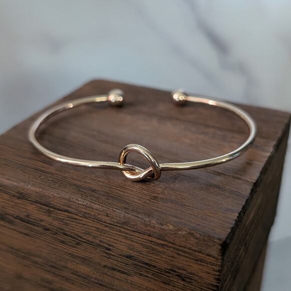 Gold Tone Cuff Bracelet with Knot Design - Picture 4 of 5